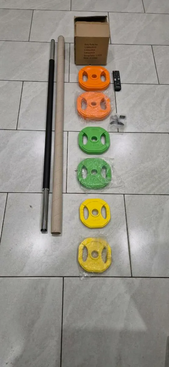 Brand new 20 kilo coloured bodypump weight set - Image 1