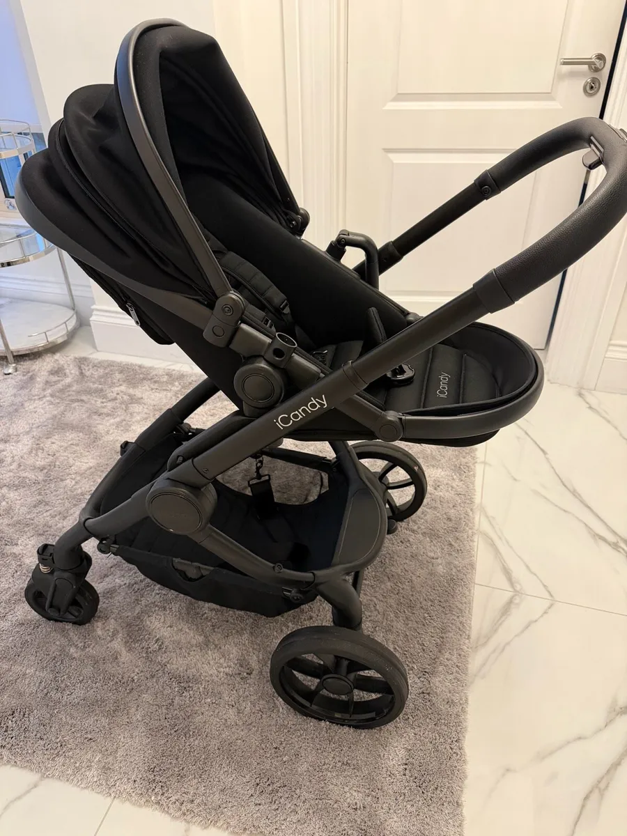 Peach 7 Black Pushchair and Carrycot - Image 1