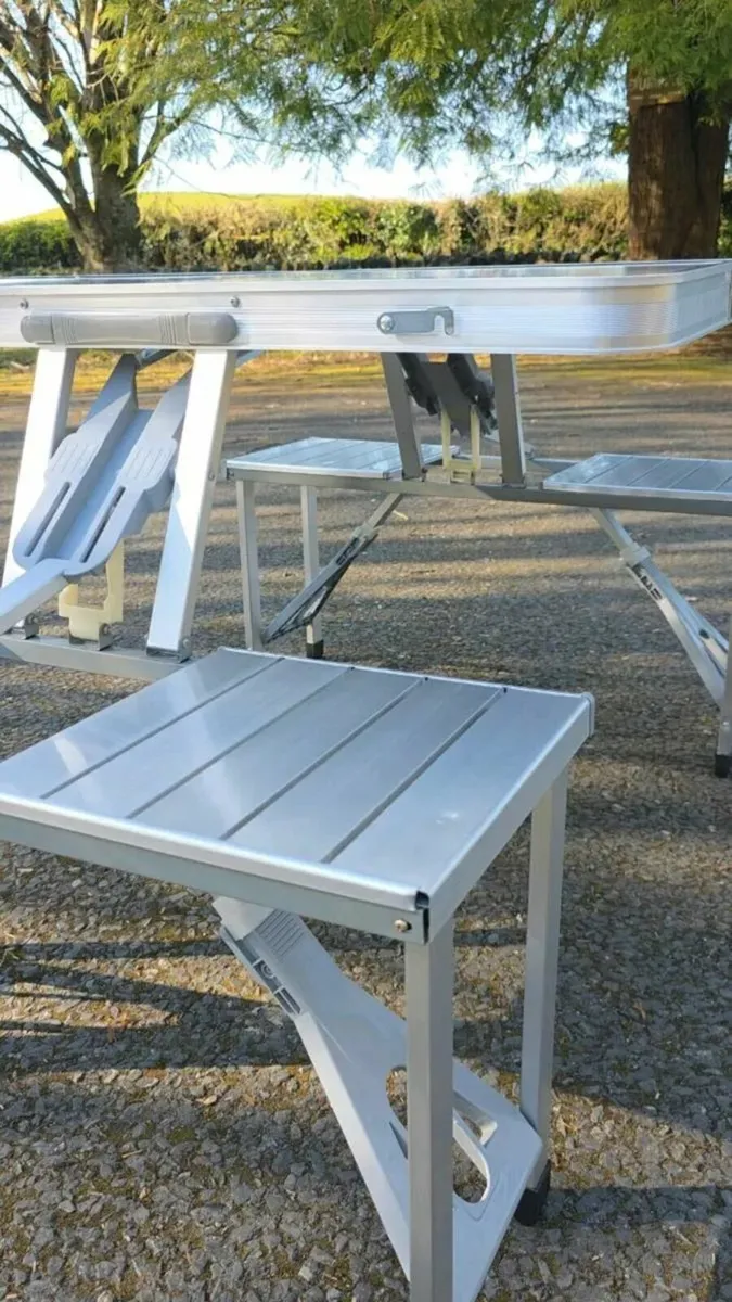 Foldable camping table with four seats. - Image 3