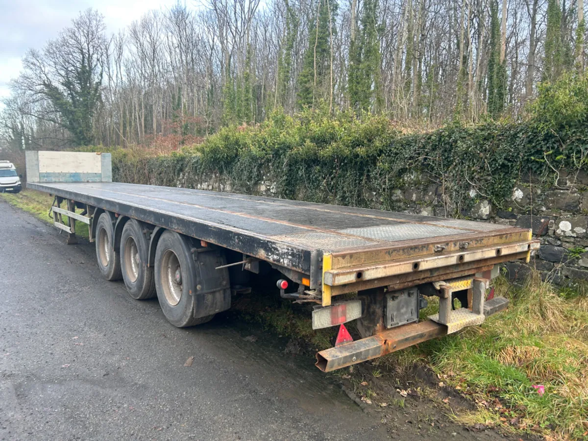 2012 sdc 3 axle flat trailer - Image 2