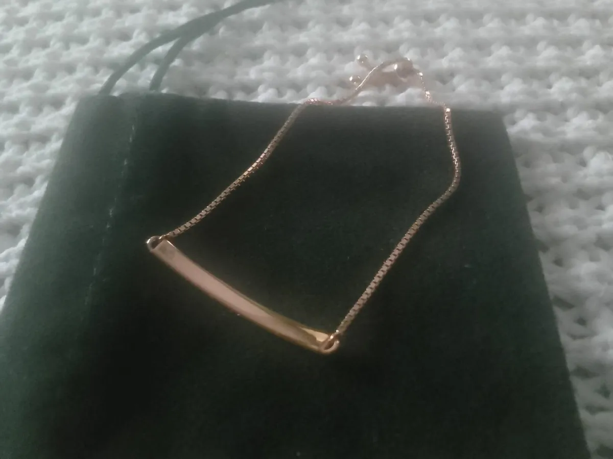 Stg silver/rose gold designer identity bracelet - Image 1