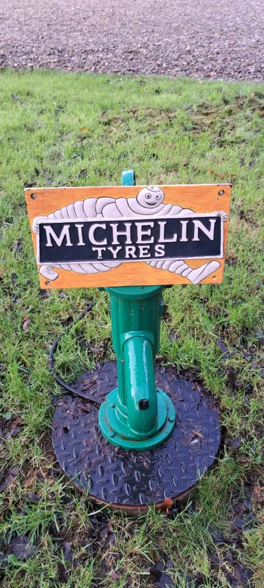 Mitchelan cast iron sign