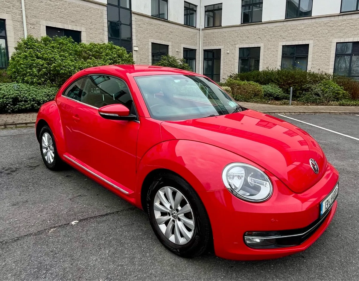 Red Volkswagen Beetle - Image 1