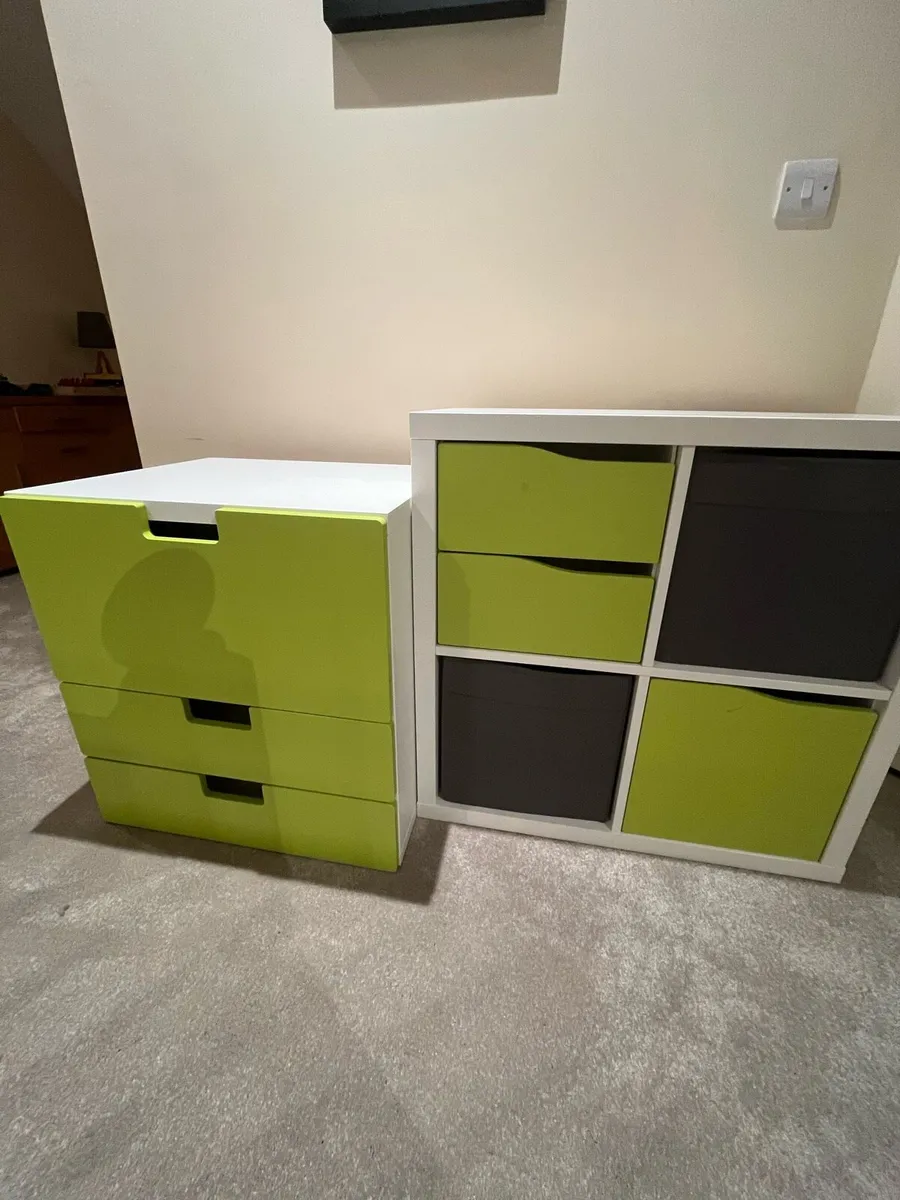 Green and white clothes storage drawers - Image 1