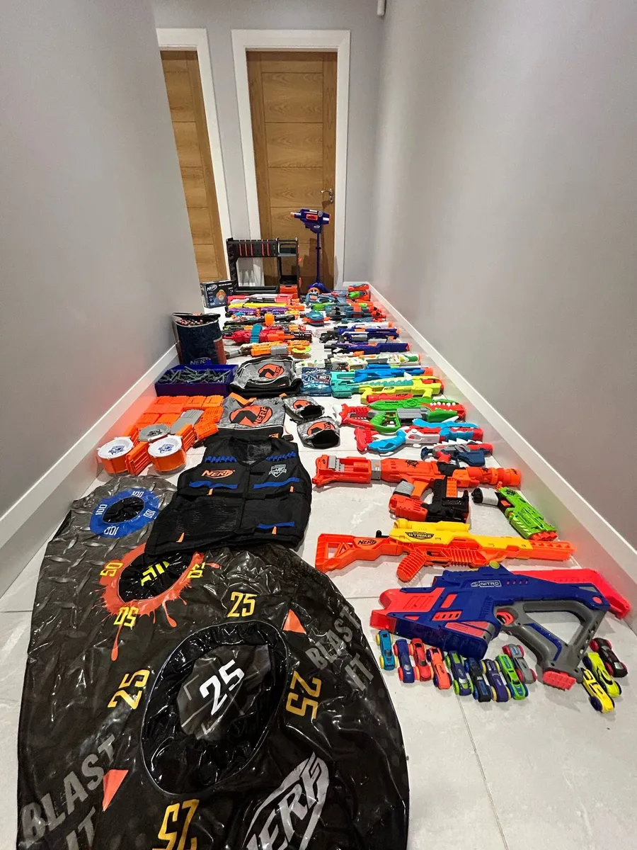 Huge collection of Nerf Guns, Gun Rack & Scooter - Image 1