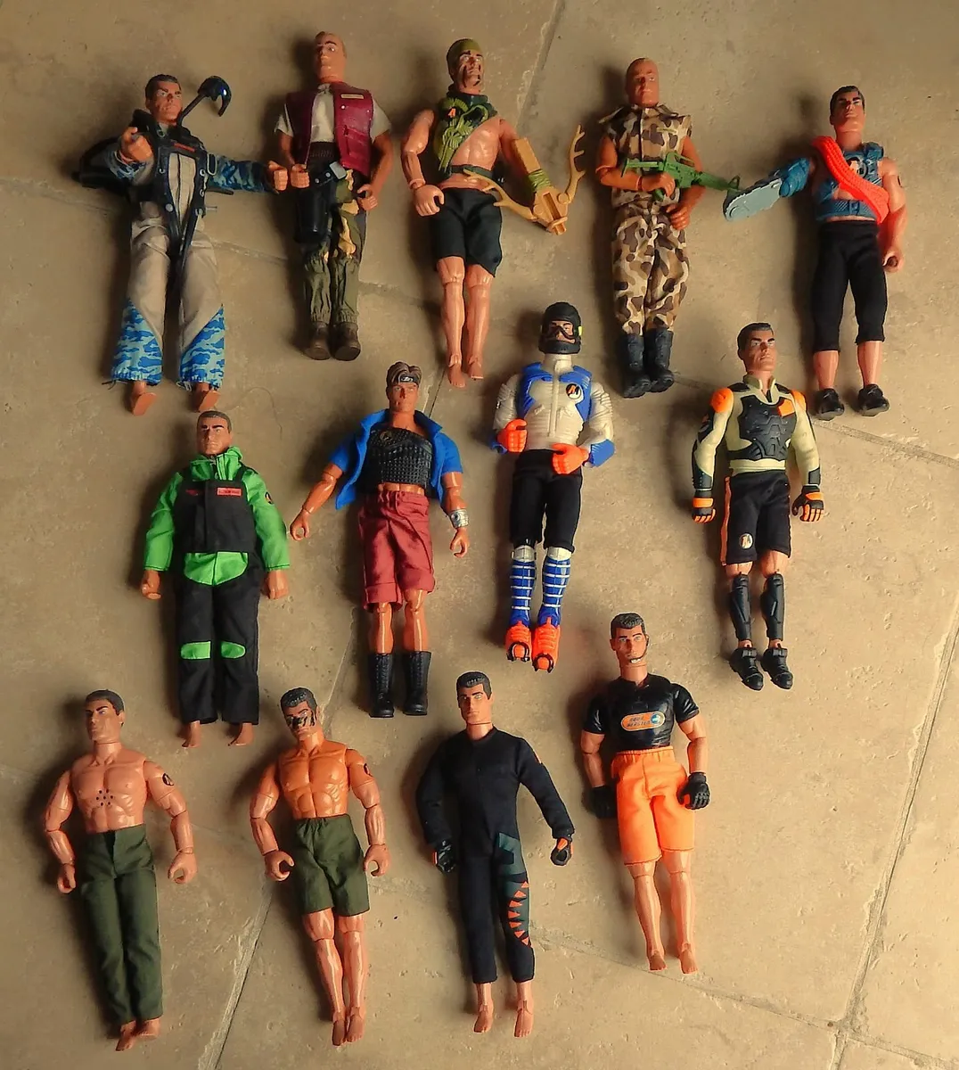 Collection of 13 Vintage Action Man Figures - Image 1