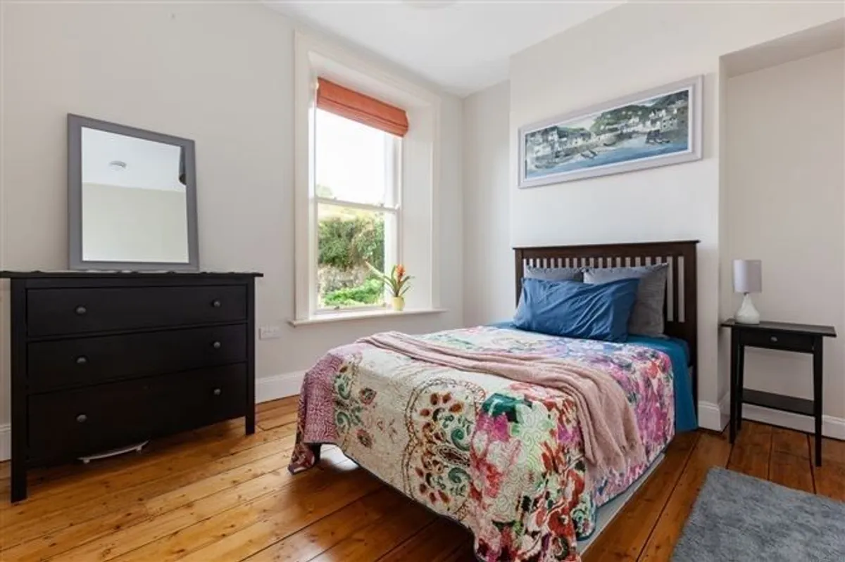 Grey mirror and grey framed picture