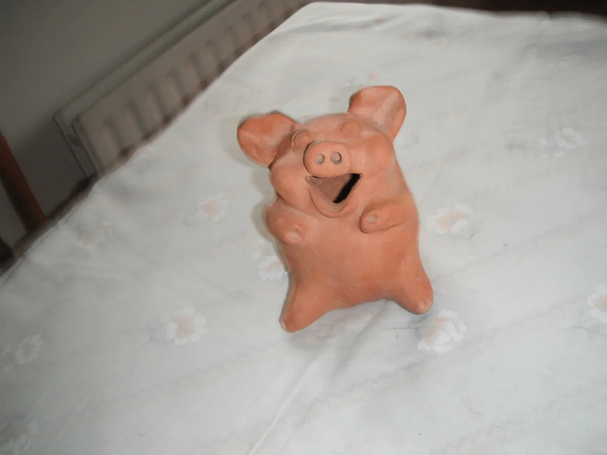 Terraccotta Clay Laughing Pig for Sale.