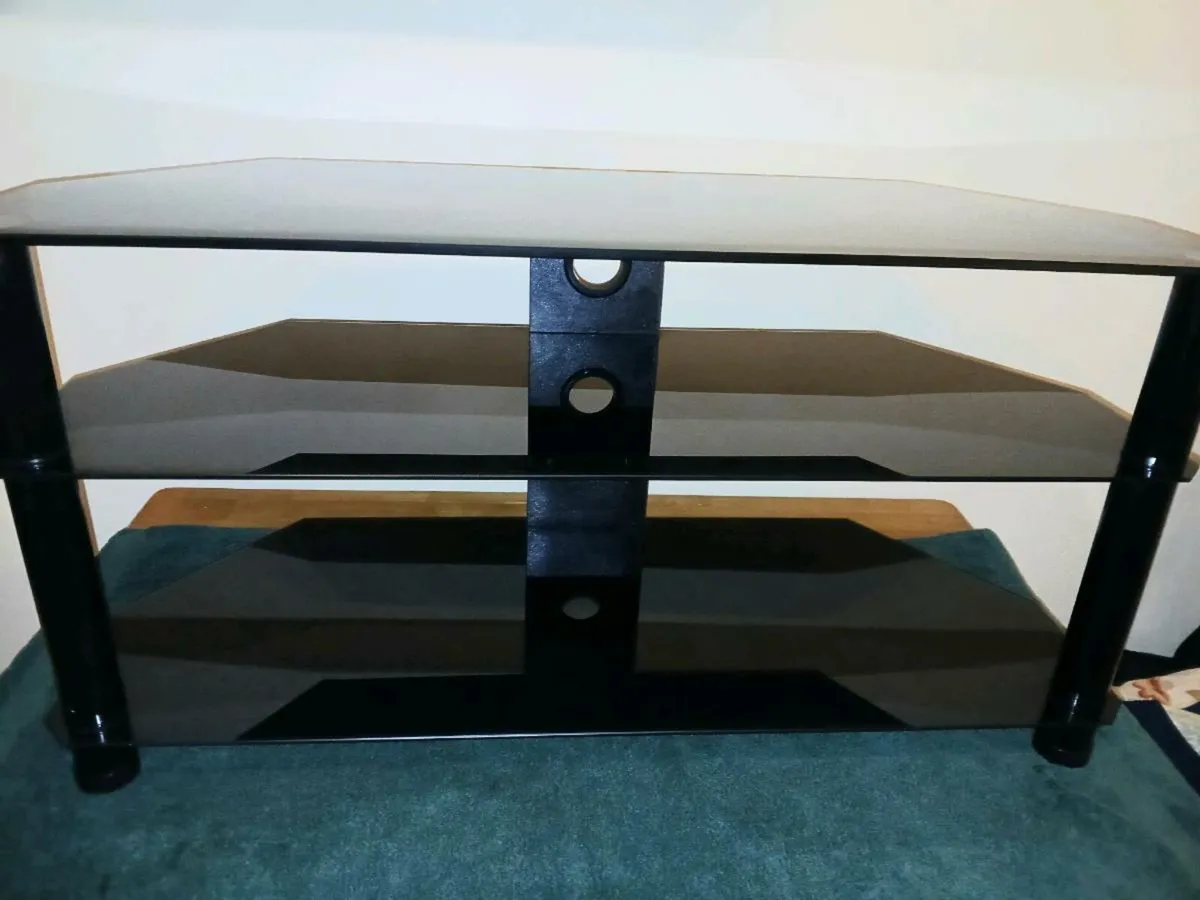 New heavy duty glass tv stand. - Image 1