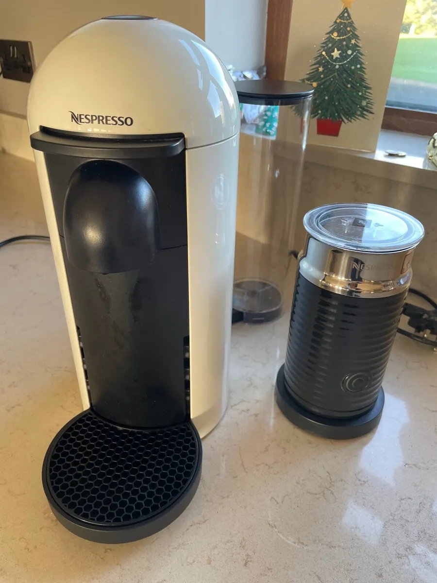 Nespresso coffee machine and milk - Image 1
