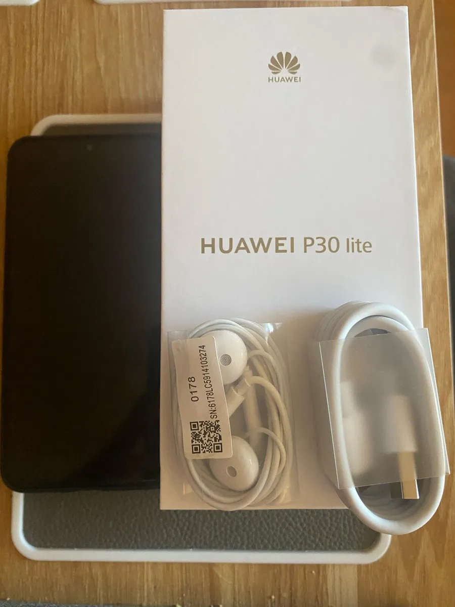 Huawei P30 Lite with new compatible case - Image 1