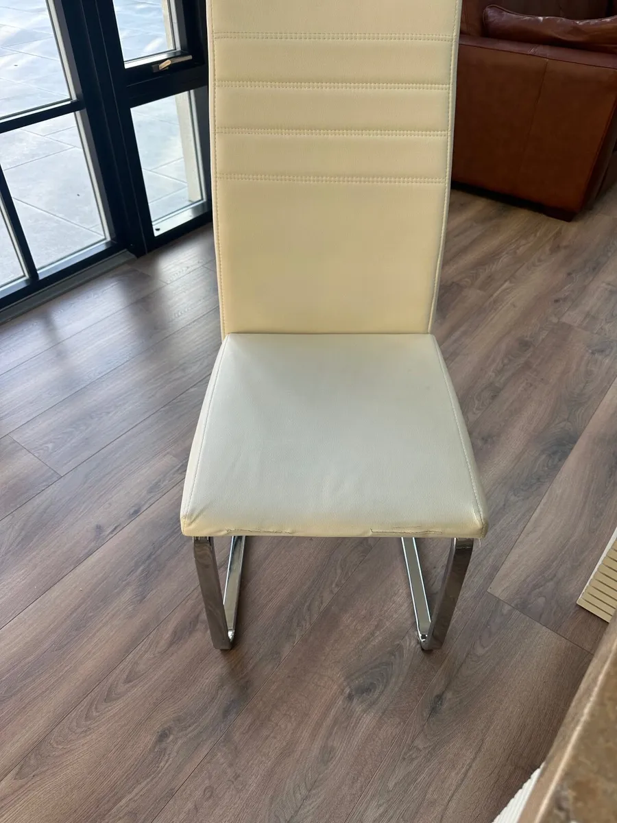 6 Leather dining chairs with slight wear and tear