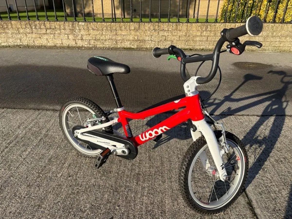 Woom 2 red children's bike with kick stand - Image 3