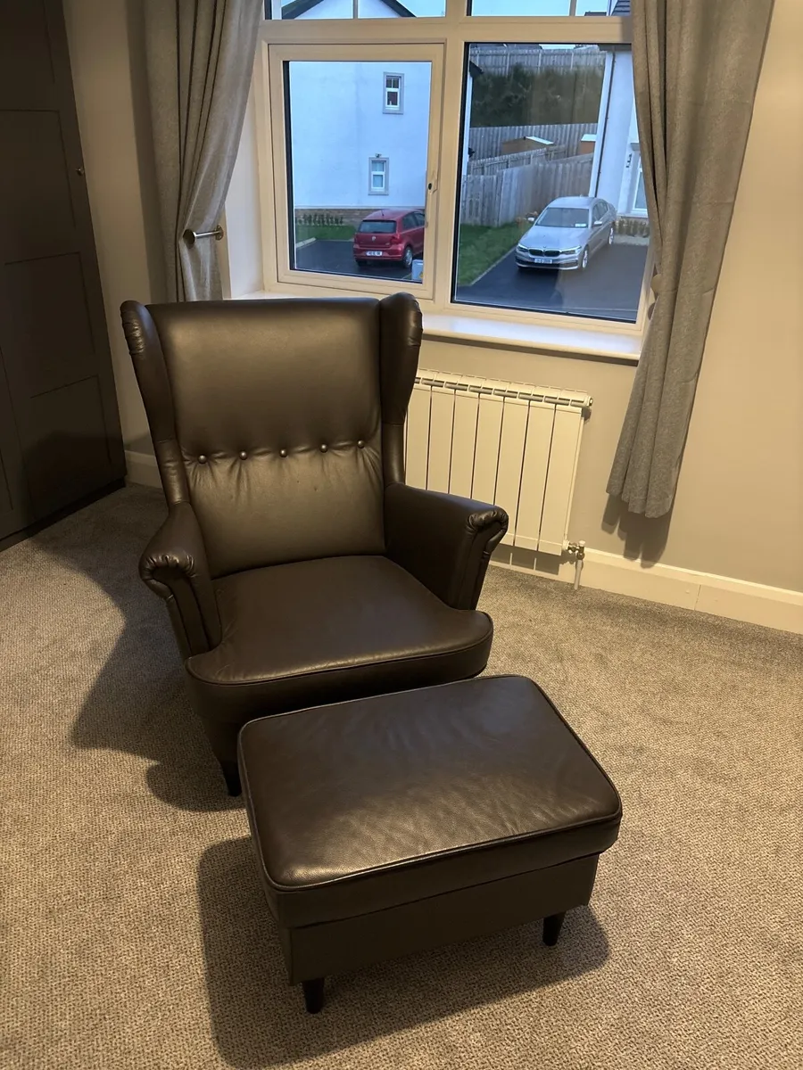 Leather armchair and footstool