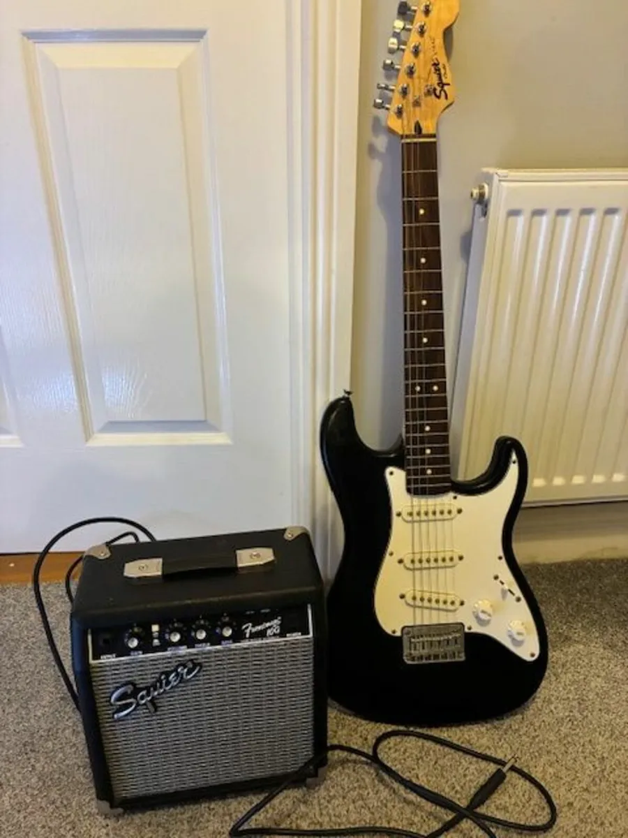 electric guitar and amp - Image 1