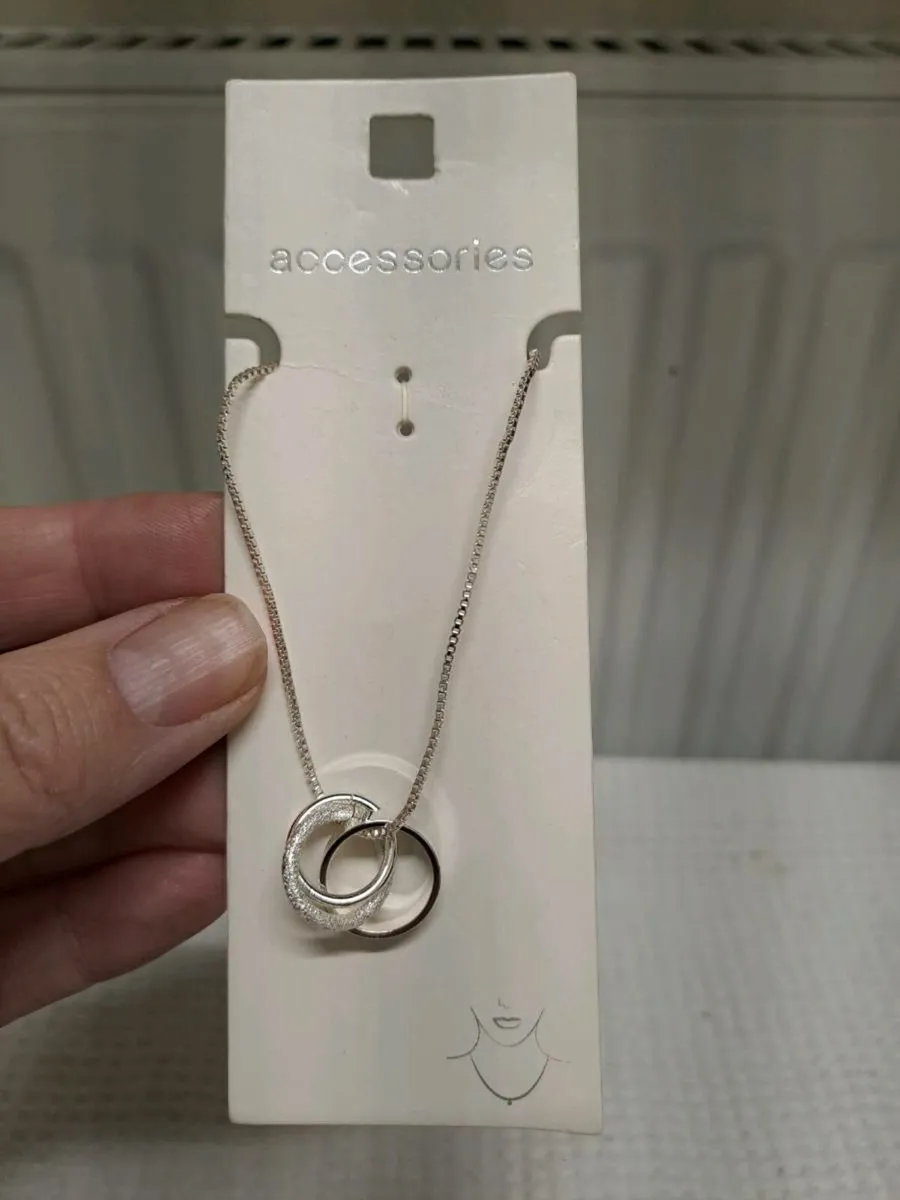 Silver-Tone Interlinked Ring Pendant Necklace - Image 1