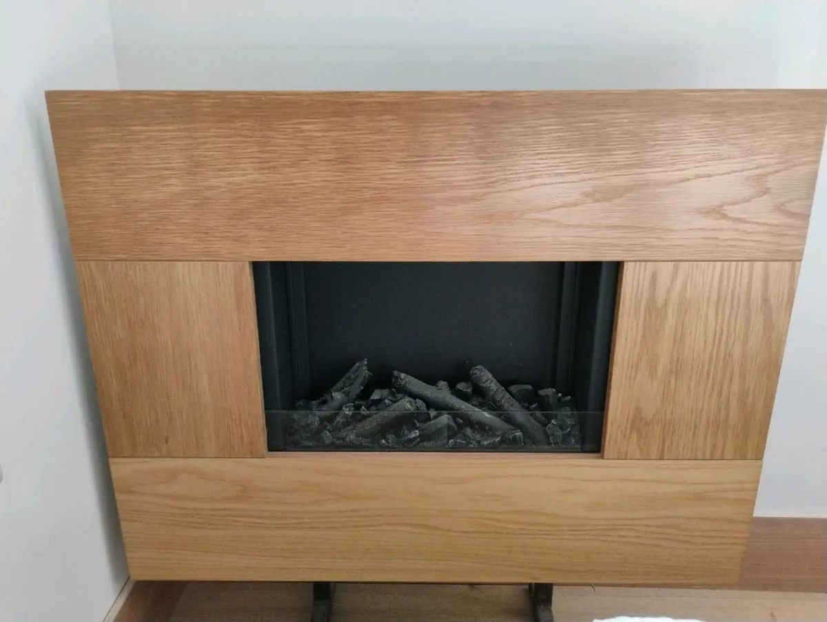 Wood effect electric fan heater