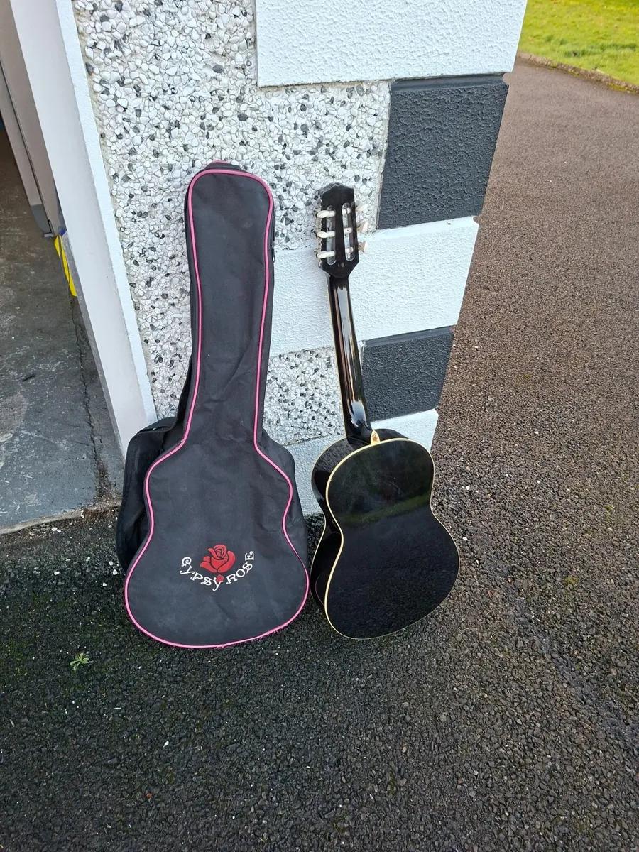 Guitar for sale with case - Image 1