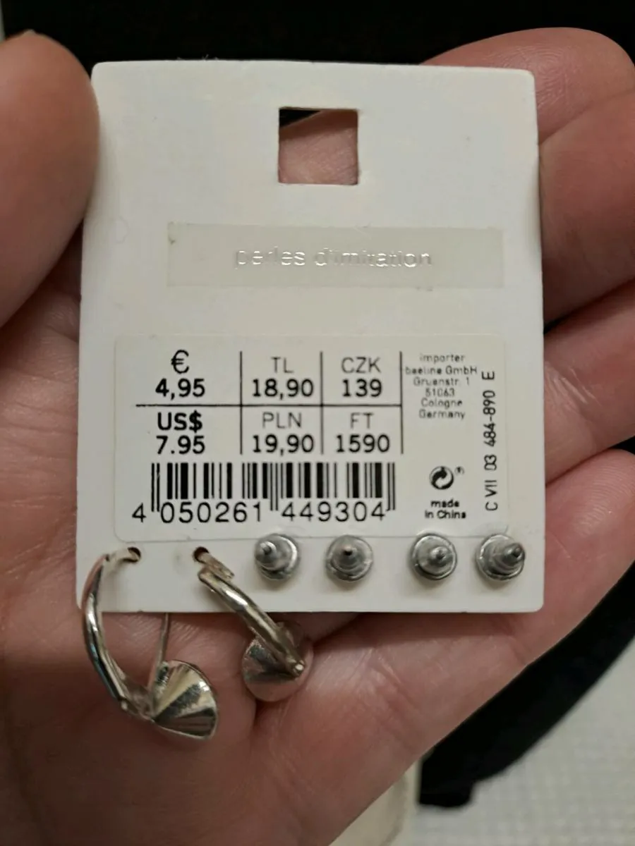 Silver necklace and multiple earrings set - Image 3