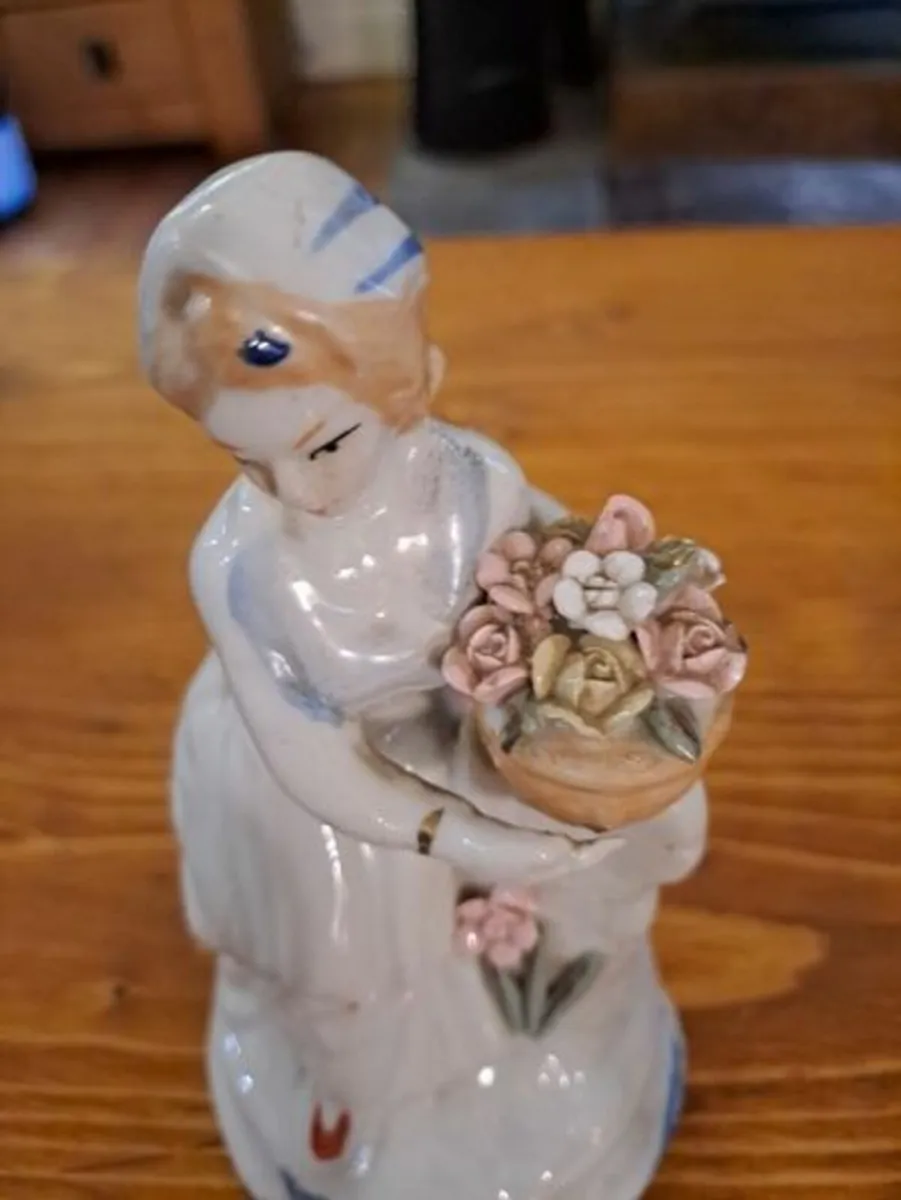 Vintage porcelain woman figurine detailed flowers - Image 4