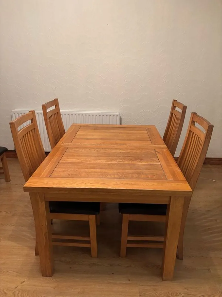 Good for rental property or private home.Real leather sofa set and solid wood 4 to 8 seater dining table and 6 chairs. - Image 1
