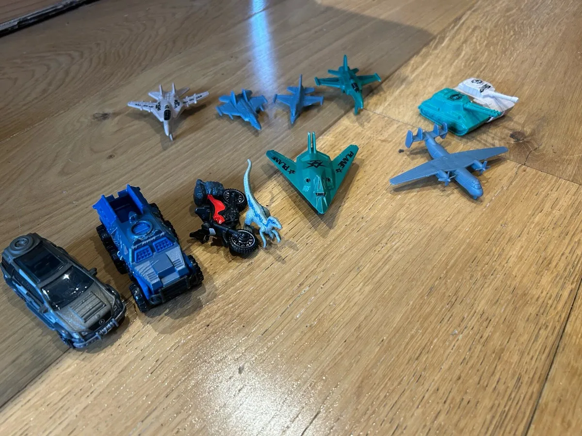 Collection of toy planes and cars - Image 1