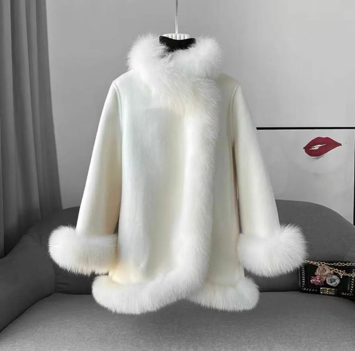 A cashmere coat with fur trim