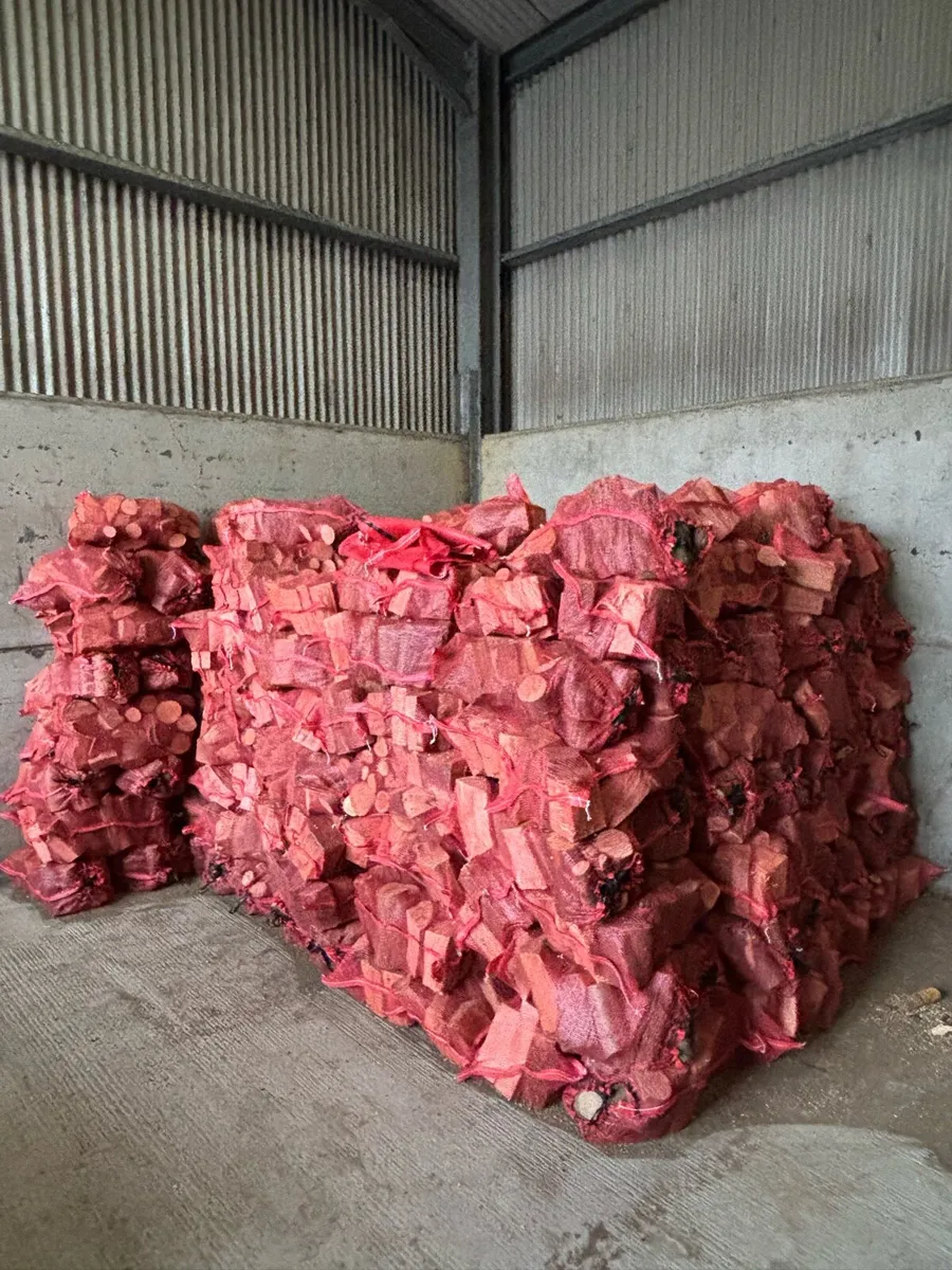 Large netted bags of seasoned firewood logs/blocks - Image 1