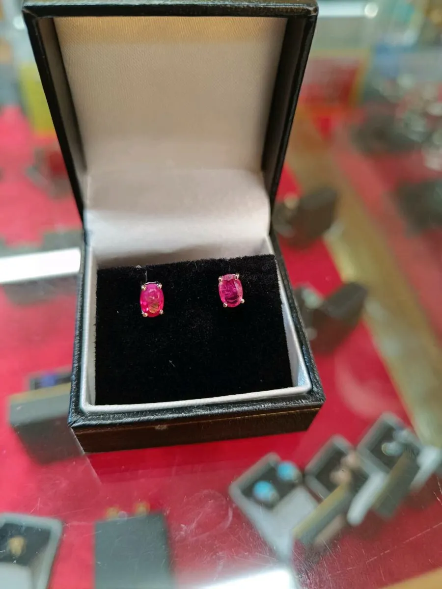 Oval Cut Ruby Studs Earrings, 18k White Gold - Image 1