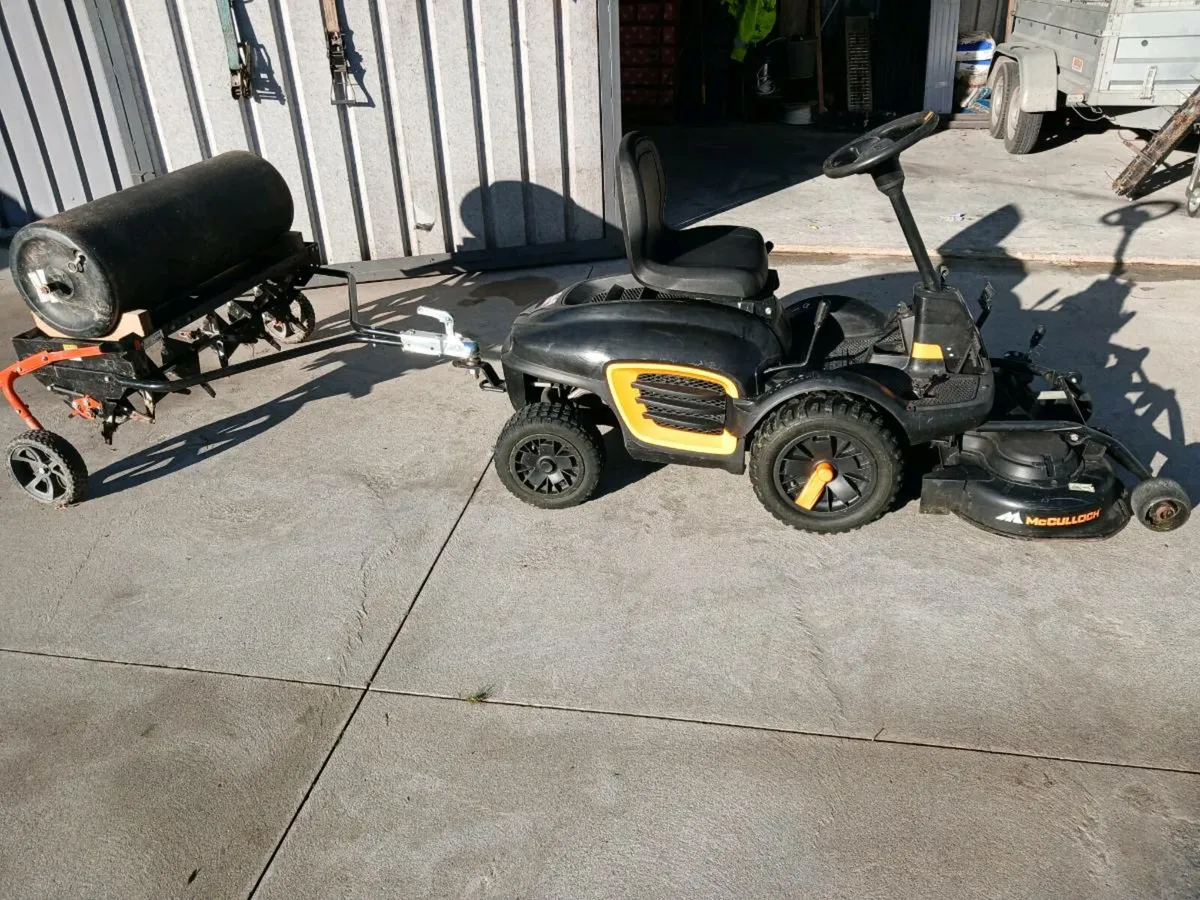 Front deck mulcher mower with aerator/scarifier - Image 1