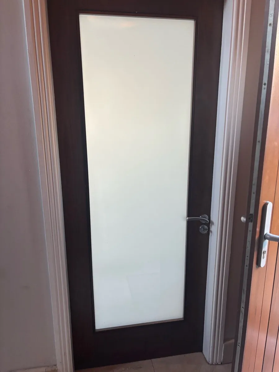 Walnut doors with glass panel
