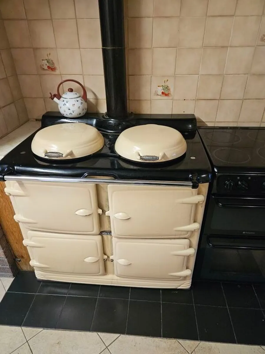 Cream Alpha Oil Range and Hotpoint Electric 4 ring Cooker - Image 1