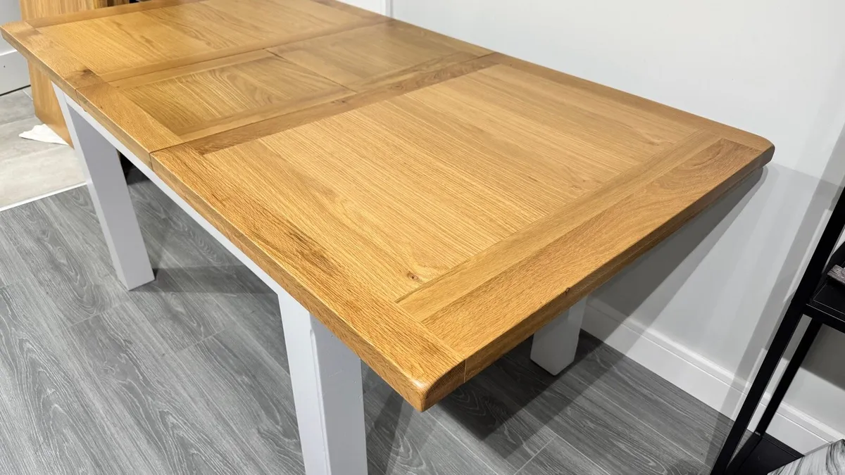 Extending Oak Dining Table Ex Display Like New - Image 1