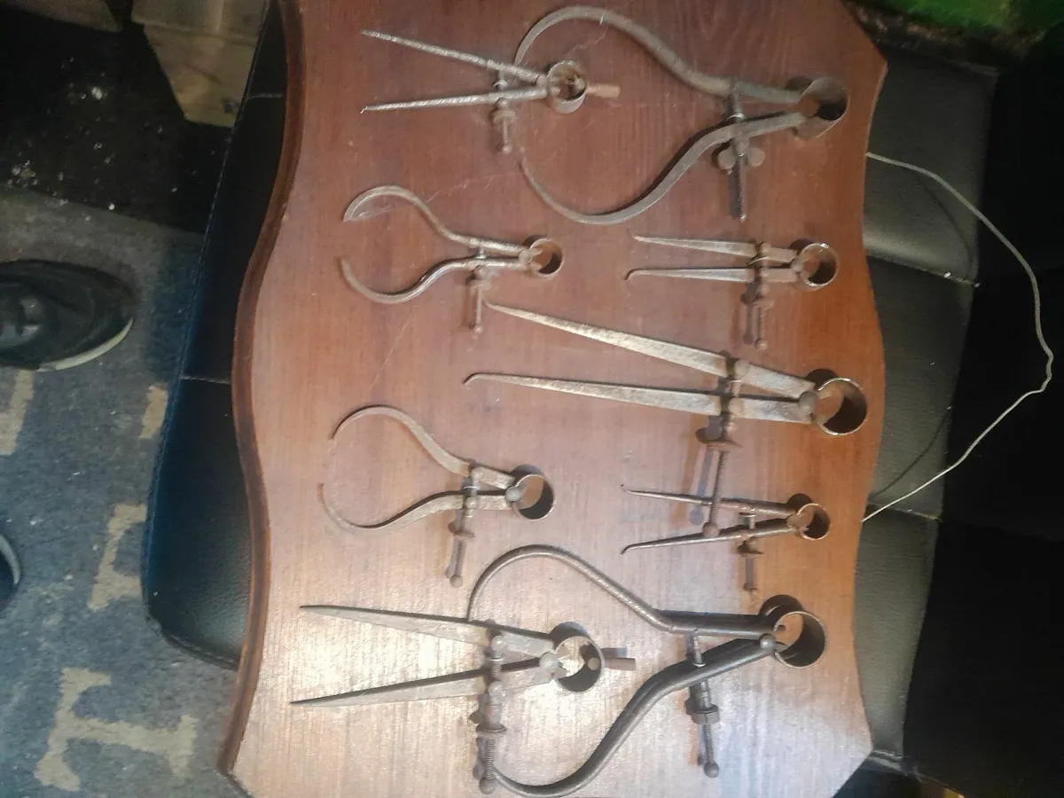 Nine  vintage  tools on plaque - Image 1