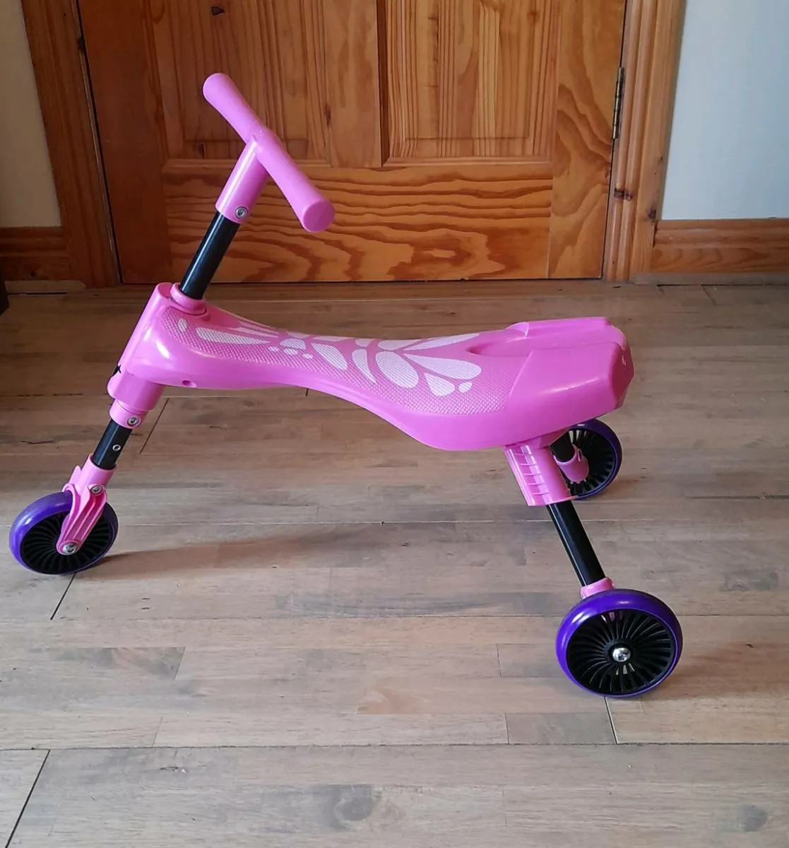 Scuttlebug pink Butterfly 3 Wheel Ride On - Image 1