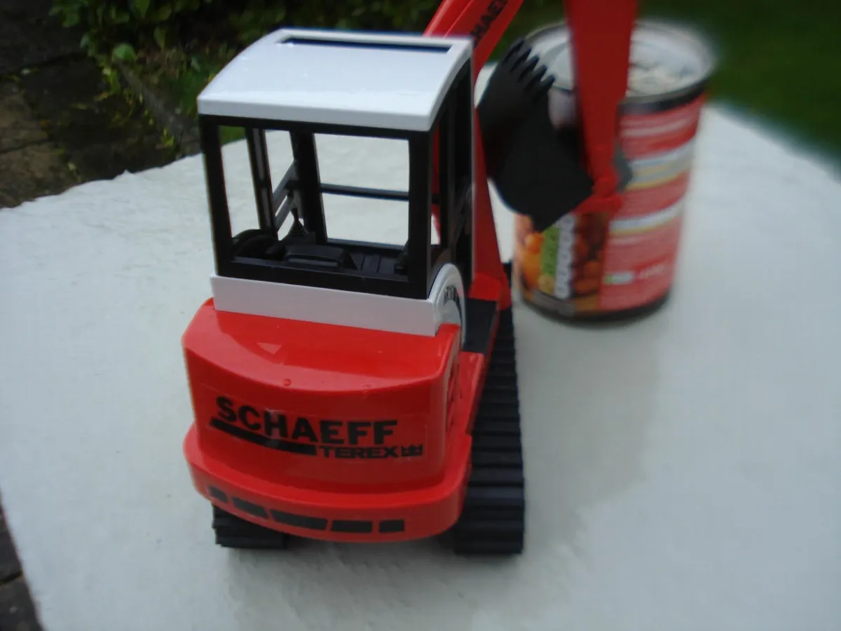 BRUDER SCHAEFF HR16 MINI EXCAVATOR. 1/16 SCALE. - Image 4