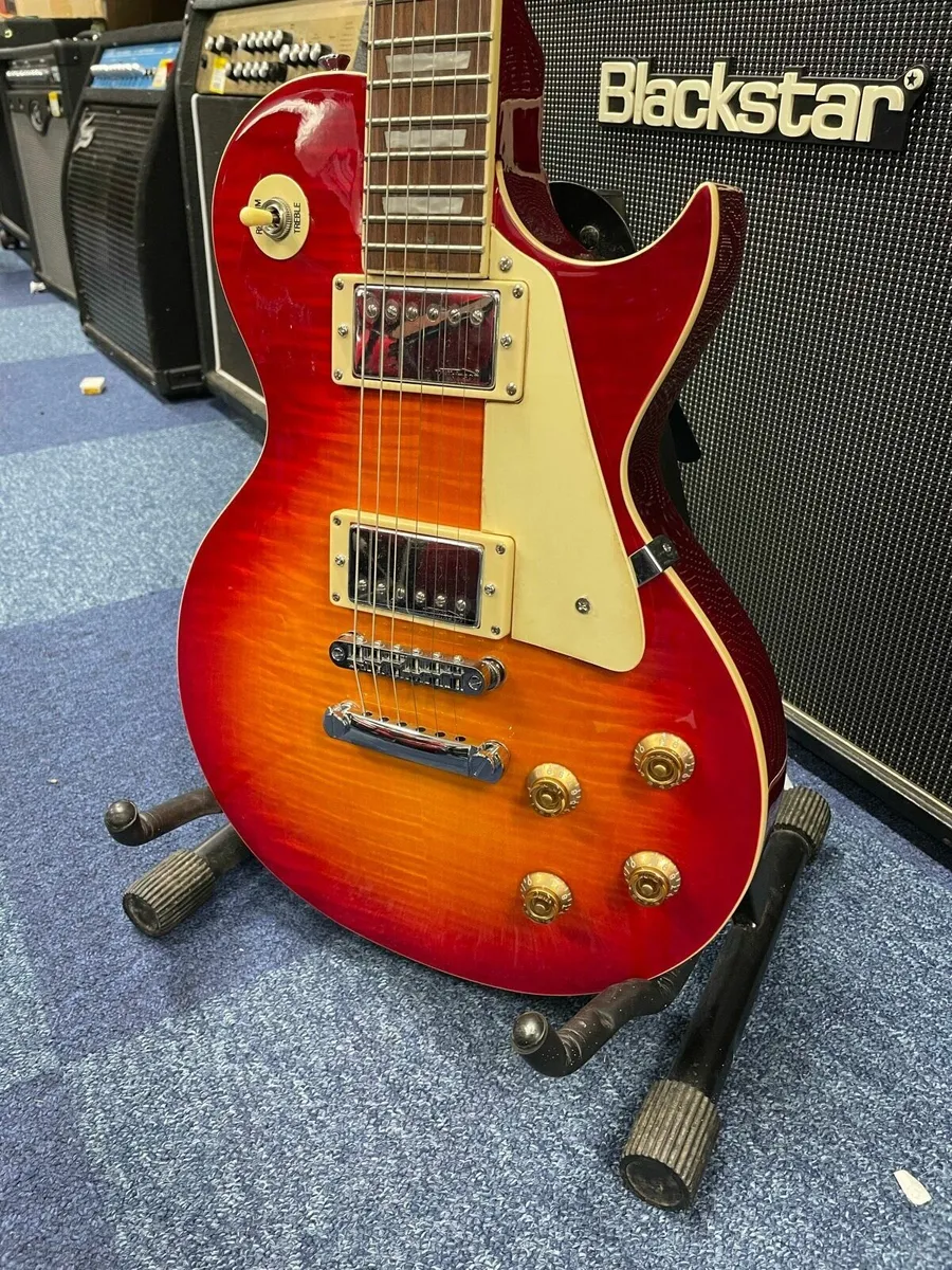 Vintage V100 Cherry Burst - Image 1