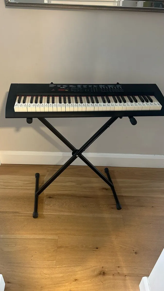 Keyboard and stand. - Image 1