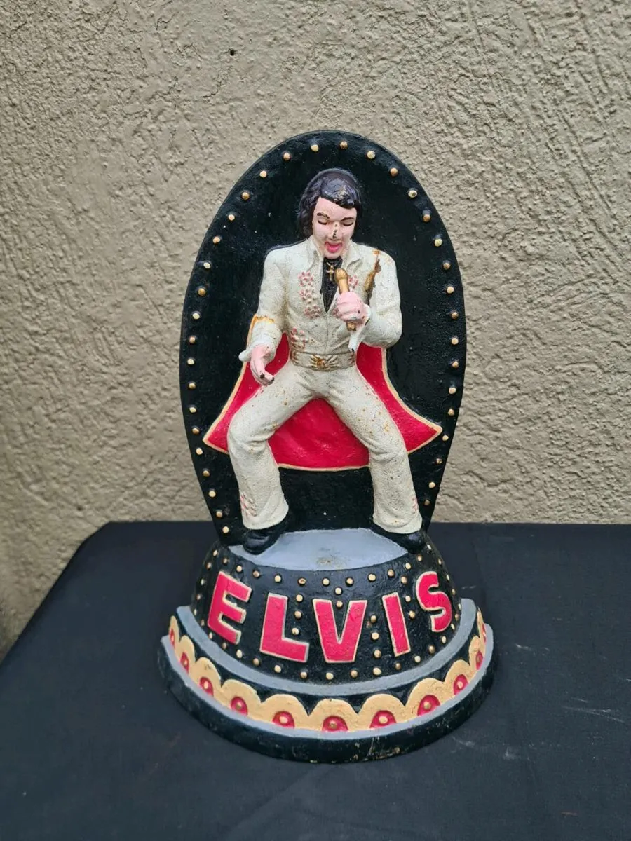 Elvis cast iron door stopper