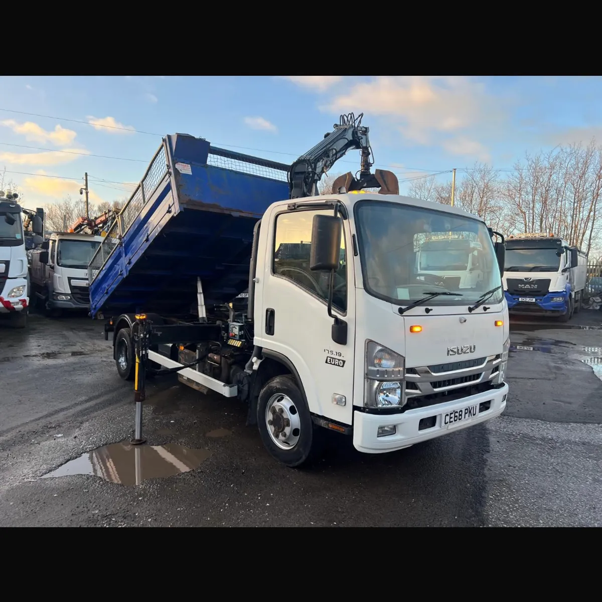 Isuzu Tipper Grab - Image 1