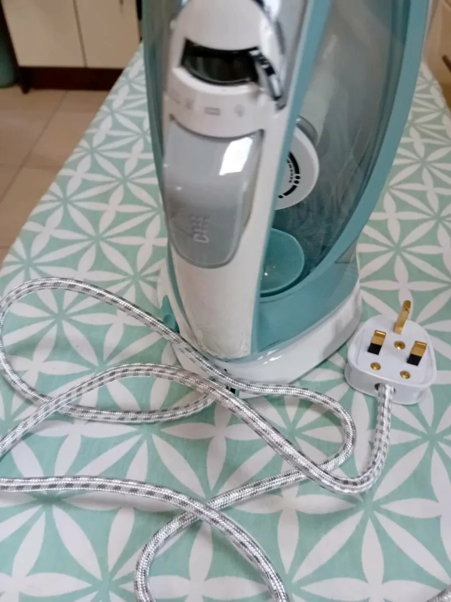 STEAM IRON NEW + IRONING BOARD - Image 1