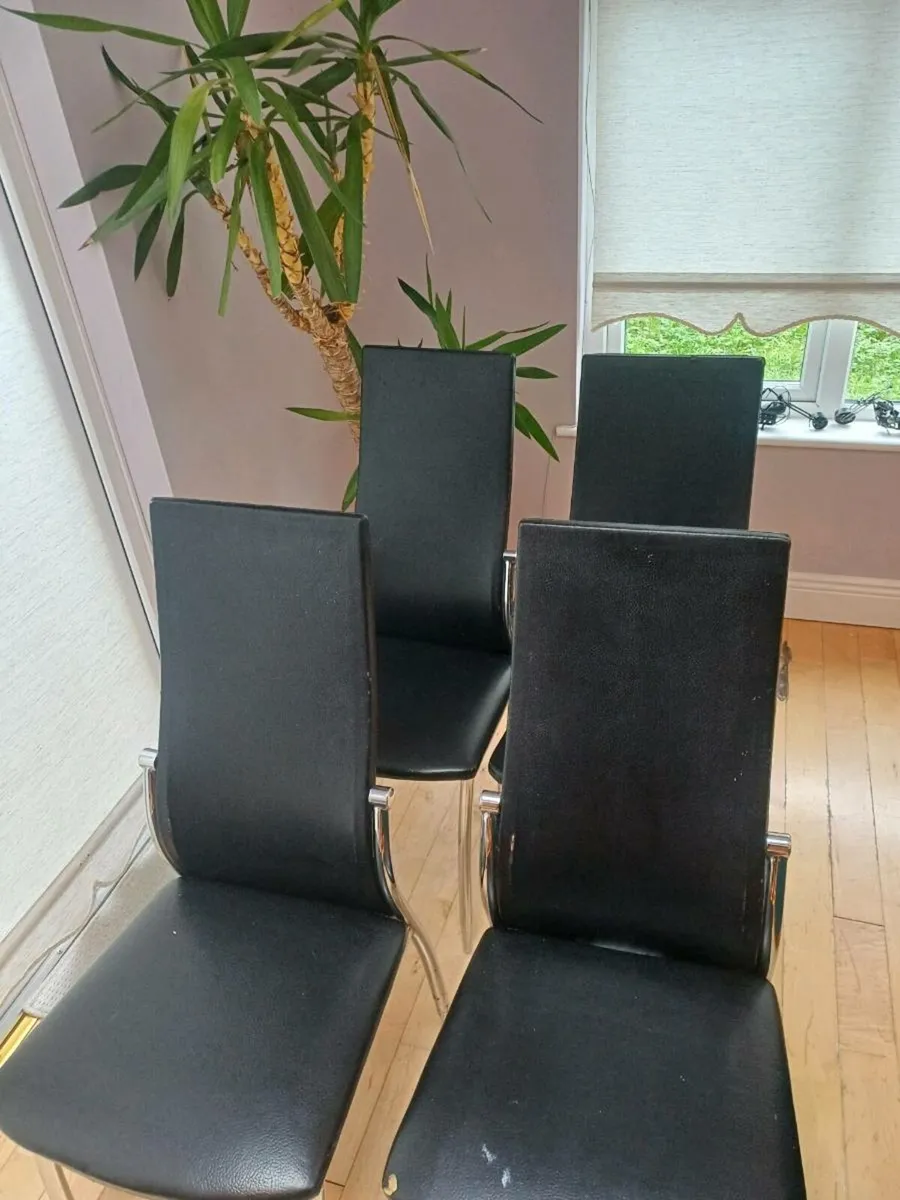 Extendable black glass kitchen table and chairs - Image 4
