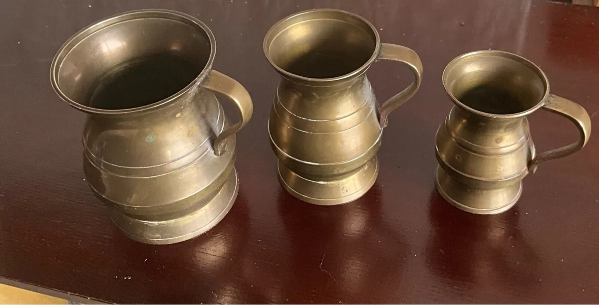 Set of 4 Antique Brass Embossed Pitchers - Image 4