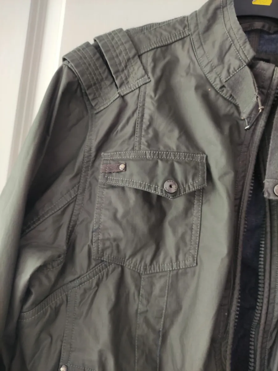 Dissident Khaki jacket fits M-L - Image 1