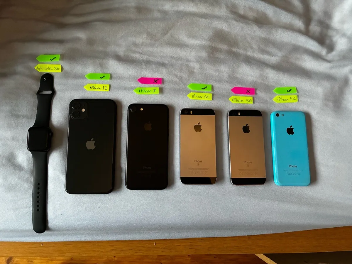 Collection of IPhones and Apple Watch - Image 1