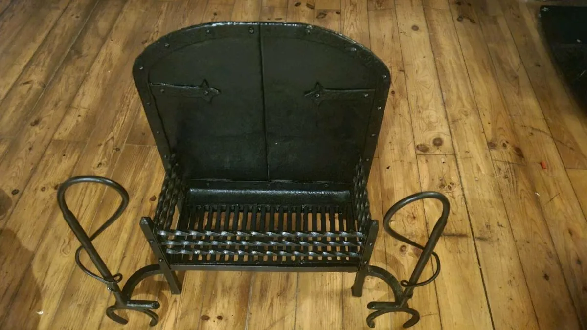 fireplace basket with twisted iron handles. - Image 1