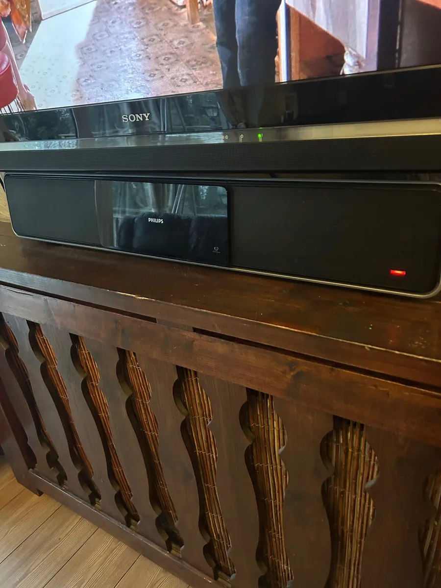 55” Sony Tv with Philips sound bar and base - Image 2