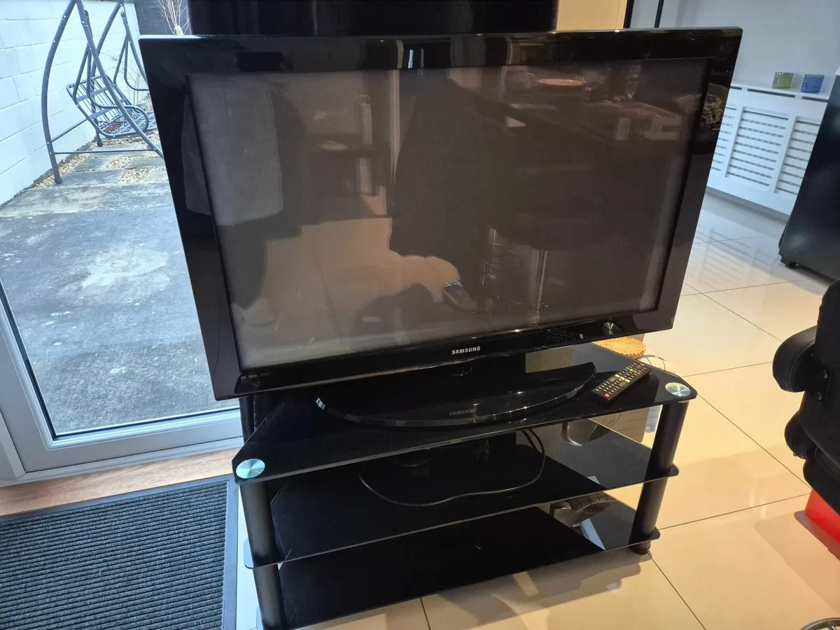 Samsung TV and stand - Image 1
