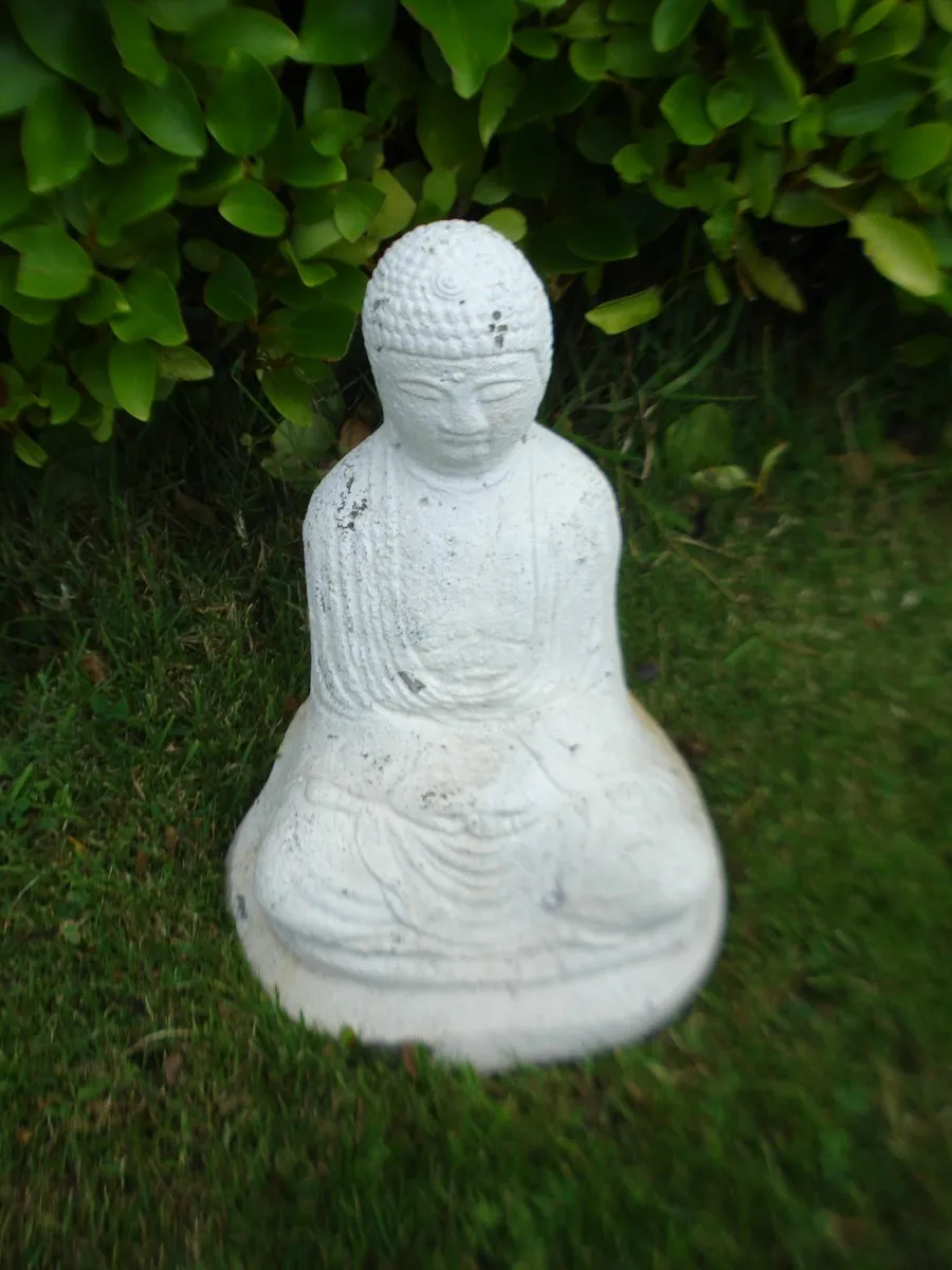 CONCRETE WHITE GARDEN BUDDHA.