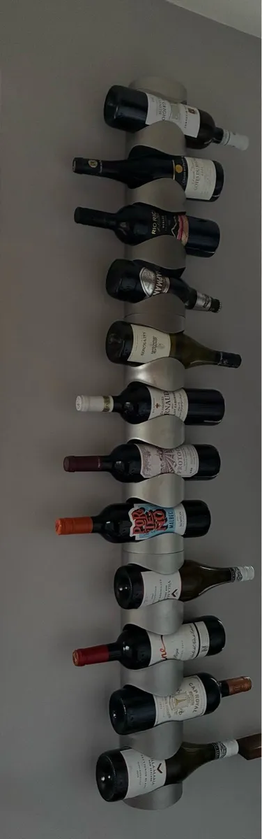 Chrome wall mounted wine racks x 3